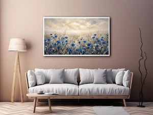 Blue wildflowers in a foggy field