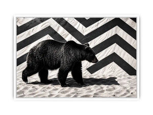 Black bear on textured sand backdrop