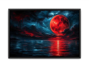 Red moon over tranquil waters