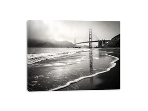 Misty coastal bridge at dawn