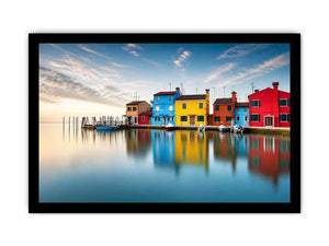 Serene waterfront at dawn with reflections
