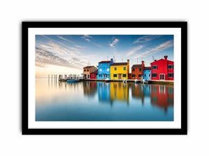 Serene waterfront at dawn with reflections