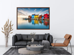 Serene waterfront at dawn with reflections