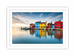 Serene waterfront at dawn with reflections