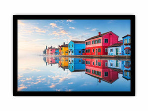 Serene waterfront village at sunrise