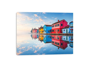Serene waterfront village at sunrise