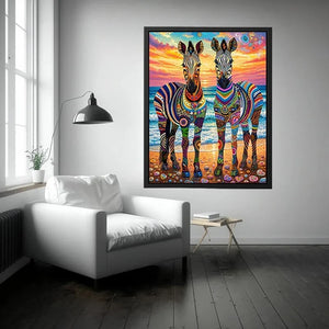 Vibrant zebras by the seaside