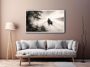 Misty lake with solitary fisherman