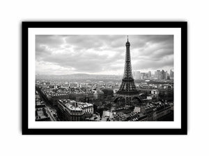 Eiffel Tower amid Parisian skyline haze