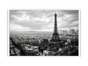 Eiffel Tower amid Parisian skyline haze