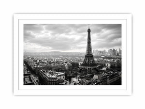 Eiffel Tower amid Parisian skyline haze
