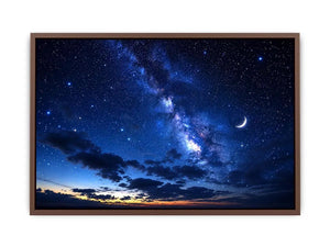 Starry night with crescent moon and clouds