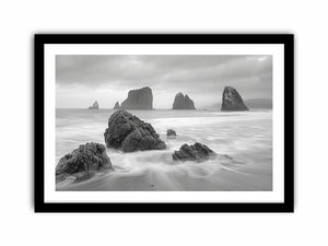 Black and white coastal landscape photography for serene living room decor