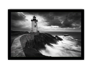 Moody black and white lighthouse Canvas Print with storm clouds