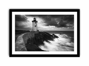 Moody black and white lighthouse Canvas Print with storm clouds