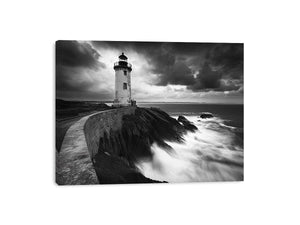 Moody black and white lighthouse Canvas Print with storm clouds