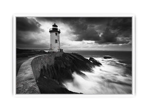 Moody black and white lighthouse Canvas Print with storm clouds