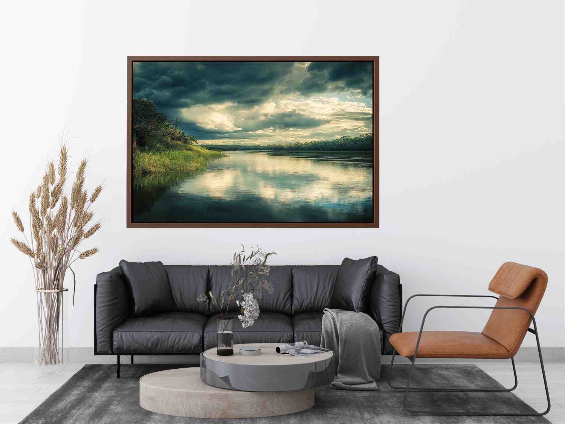 Moody lake Canvas Print with dramatic clouds and reflections