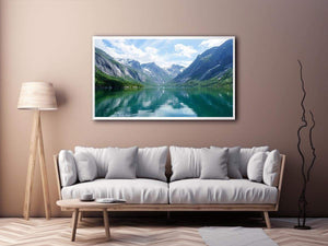 Mountain fjord landscape with reflective lake