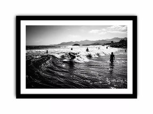black and white surfing wave with surfers ocean Canvas Print canvas