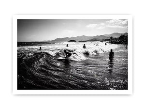 black and white surfing wave with surfers ocean Canvas Print canvas