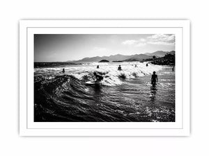 black and white surfing wave with surfers ocean Canvas Print canvas
