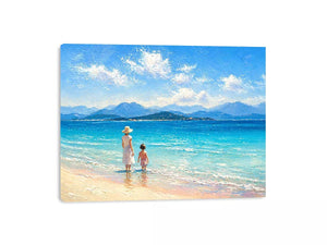 serene beach scene with woman and child ocean Canvas Print canvas