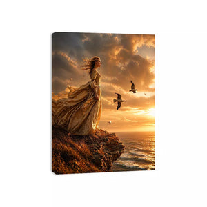 Vintage woman standing on ocean cliff at sunset Canvas Print, dramatic coastal decor