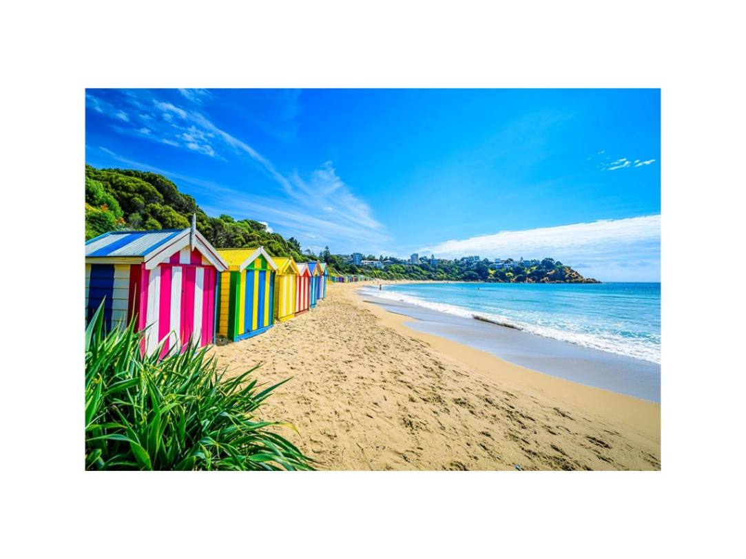 Beach Huts Along The Shore 