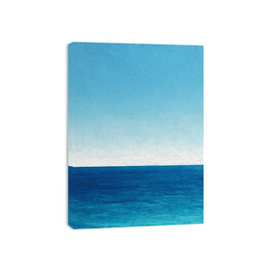Minimalist blue ocean canvas art with calm horizon and textured sky for coastal bedroom decor.