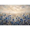 Blue wildflowers in a foggy field
