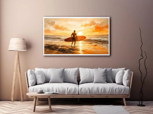 Surfer at sunset on the shore