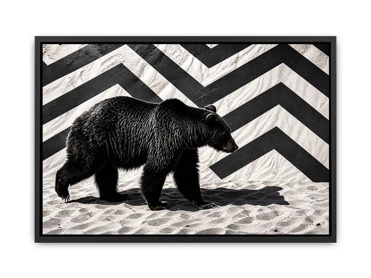 Black bear on textured sand backdrop