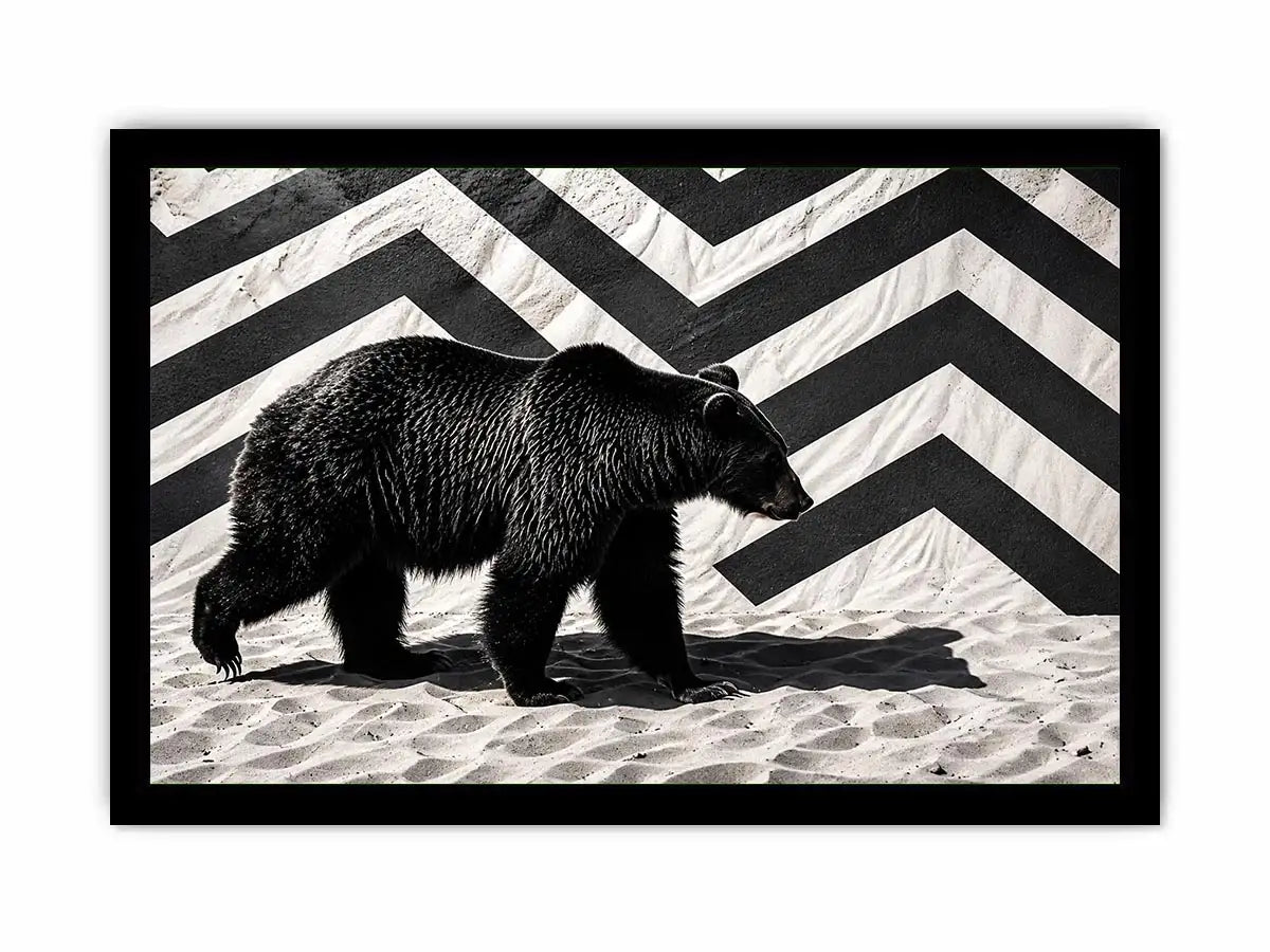 Black bear on textured sand backdrop