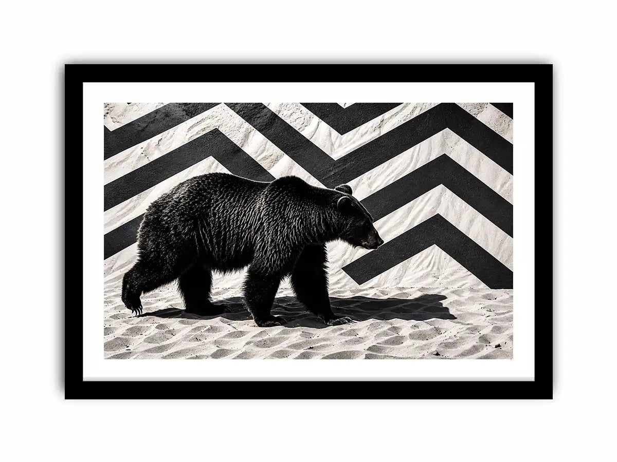 Black bear on textured sand backdrop