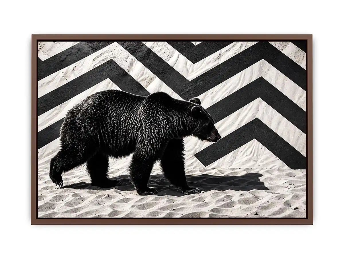 Black bear on textured sand backdrop