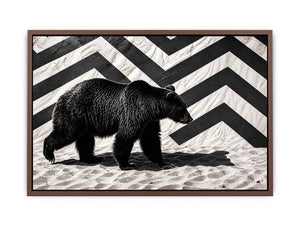 Black bear on textured sand backdrop