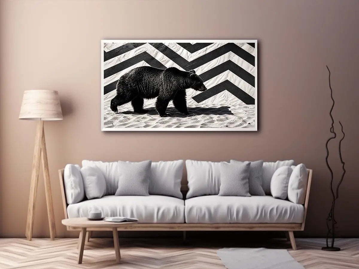 Black bear on textured sand backdrop