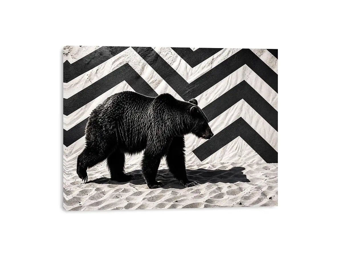 Black bear on textured sand backdrop