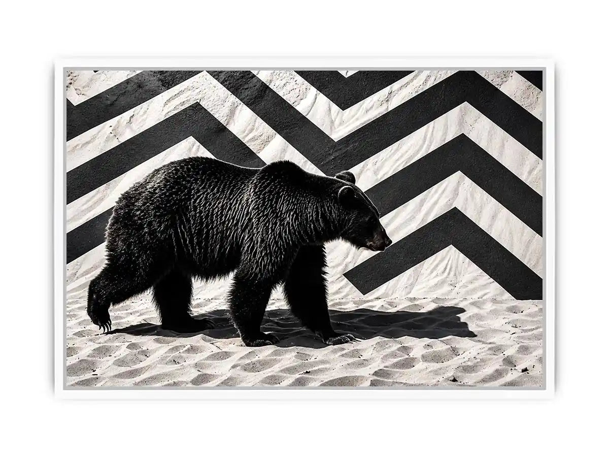 Black bear on textured sand backdrop