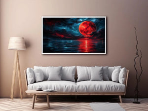 Red moon over tranquil waters