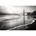 Misty coastal bridge at dawn