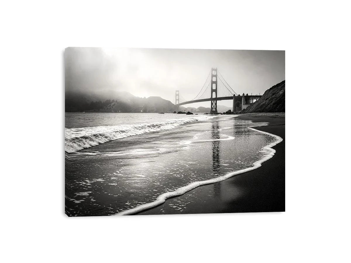 Misty coastal bridge at dawn