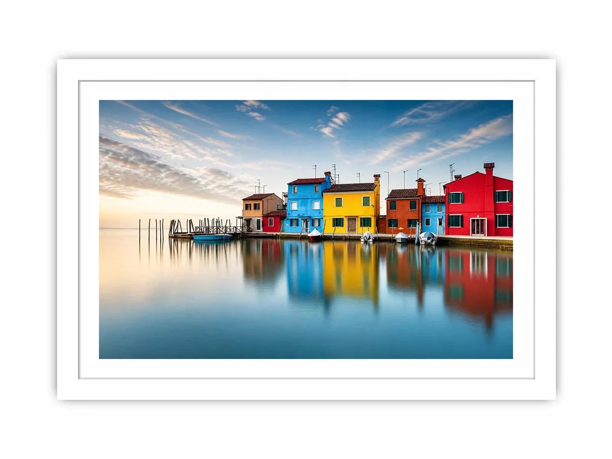 Serene waterfront at dawn with reflections
