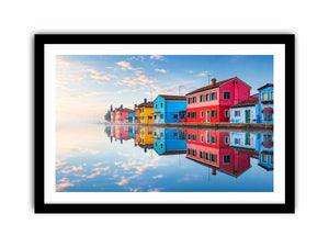 Serene waterfront village at sunrise