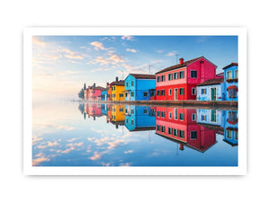 Serene waterfront village at sunrise