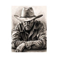 Rugged cowboy in contemplative pose