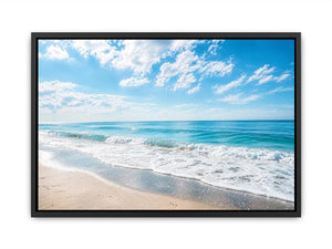 Tranquil coastal beach under blue skies