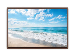 Tranquil coastal beach under blue skies