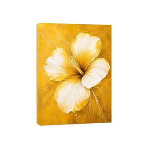 Golden hibiscus blossom on textured gold background